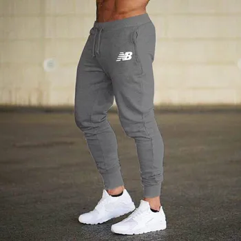 Prekės vyriški laisvalaikio sportinės kelnės mados jogger raišteliu kelnės vientisos spalvos vyriški hip-hop jogger fitneso kelnės sporto salė